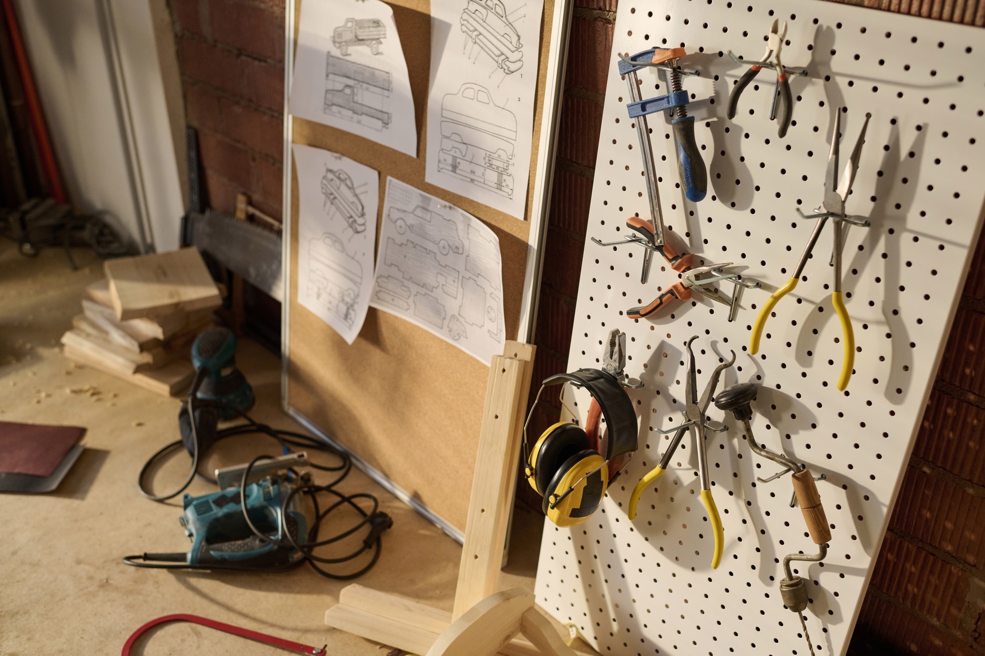 Close Up of Carpenters Tools on Pegboard in Workshop